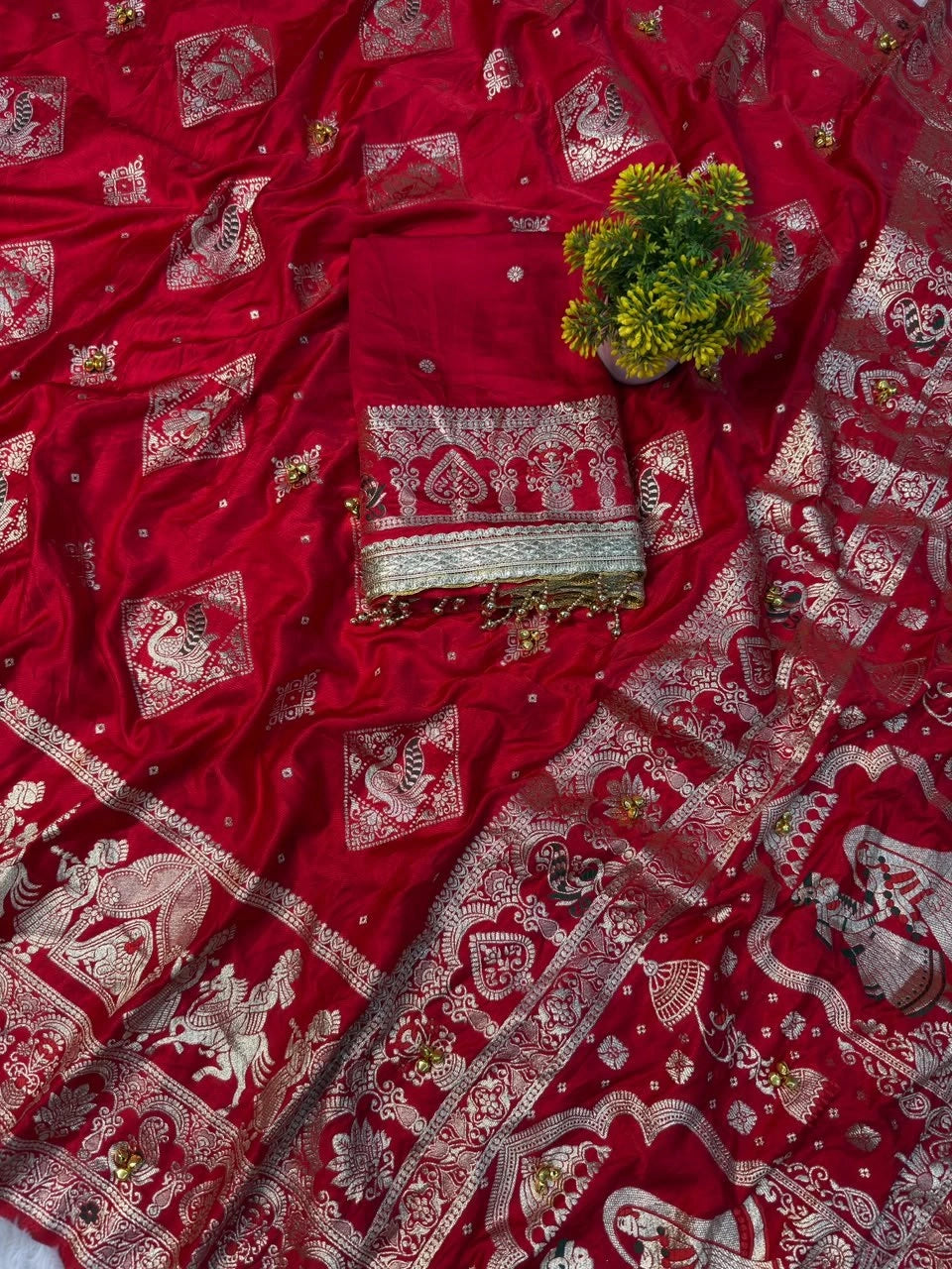 Red saree with ghungroo work and woven pallu